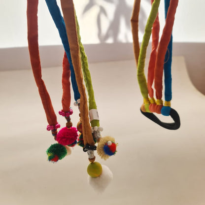 TESSAL: BUN STRINGS